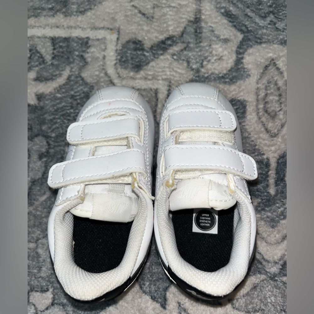 Nike with Velcro Straps.